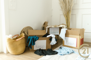 A picture of a mess of clothes in boxes