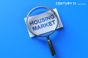 Picture of a magnifying glass focused on the words Housing Market